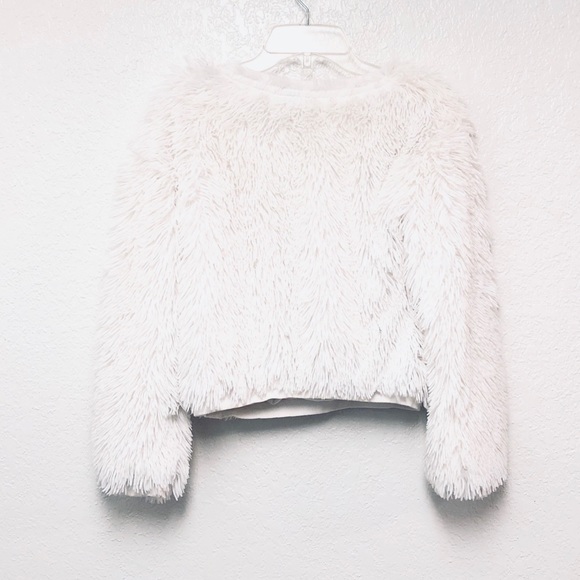 white fluffy sweaters